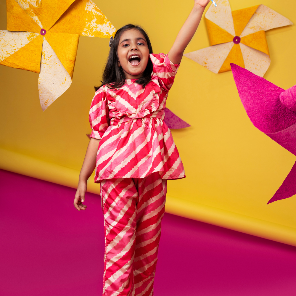 ⁠Pink Leheriya peplum and pant set